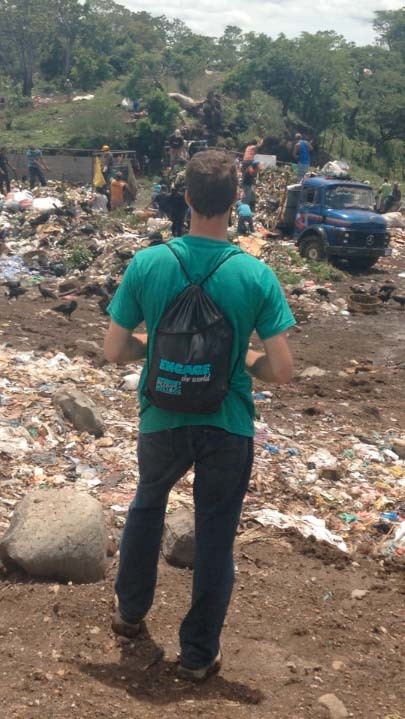Mark Brahier observes activity in the La Joya garbage dump outside of Granada, Nicaragua