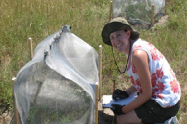 Erica Kistner, biology graduate student, works in the field