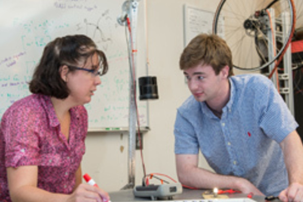 Prof. Abigail Mechtenberg and student Luke Maillie discuss their gravity light project