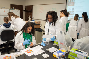 Graduate student women share joy of science and engineering with middle school girls