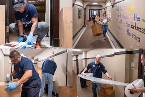 Notre Dame staff pack up student books and other requested items