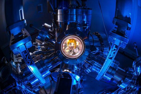 Dark Physics Lab that is glowing blue