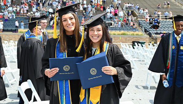 Two students commencement