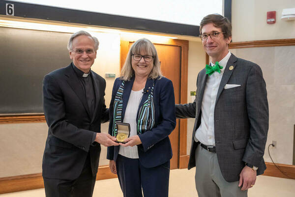 Donna Strickland with Fr. John Jenkins and Santiago Schnell