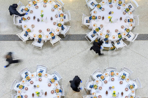Tables set up in the Jordan Hall of Science Galleria for the annual Deans Award Luncheon